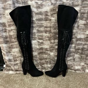 Over the knee black boots; lace up on side; inner zipper closure; round toe; 7.5